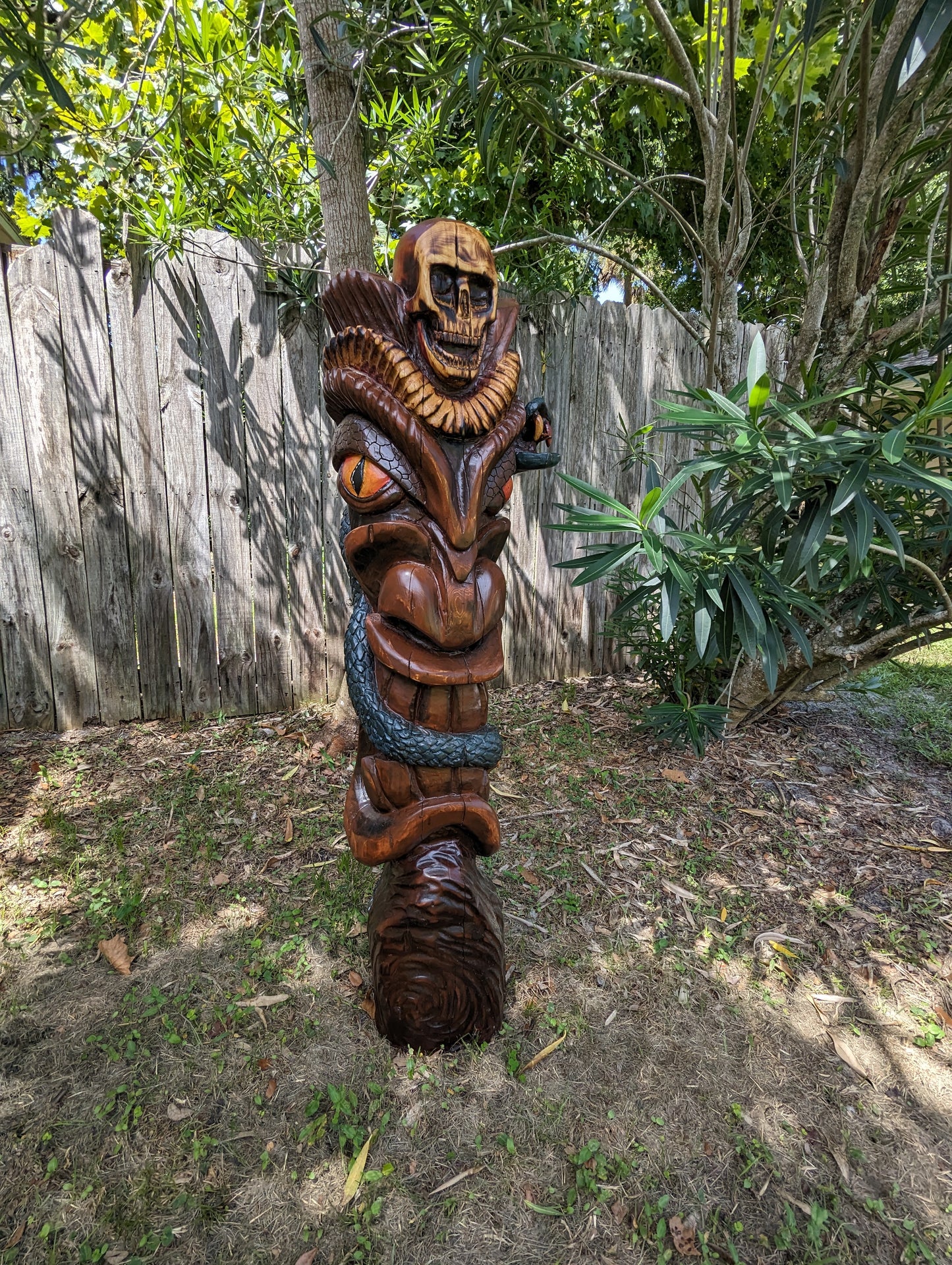 Snake and skull tiki