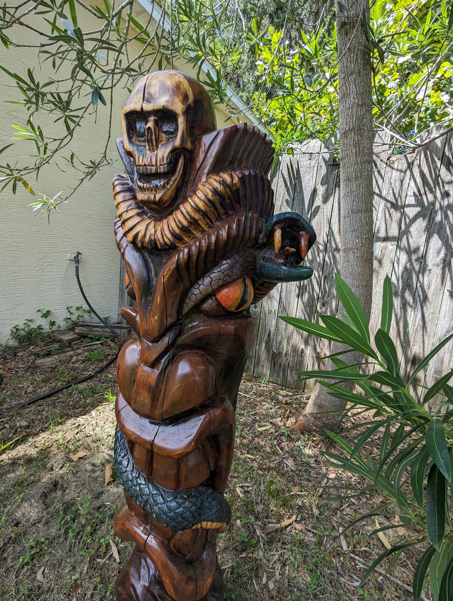 Snake and skull tiki