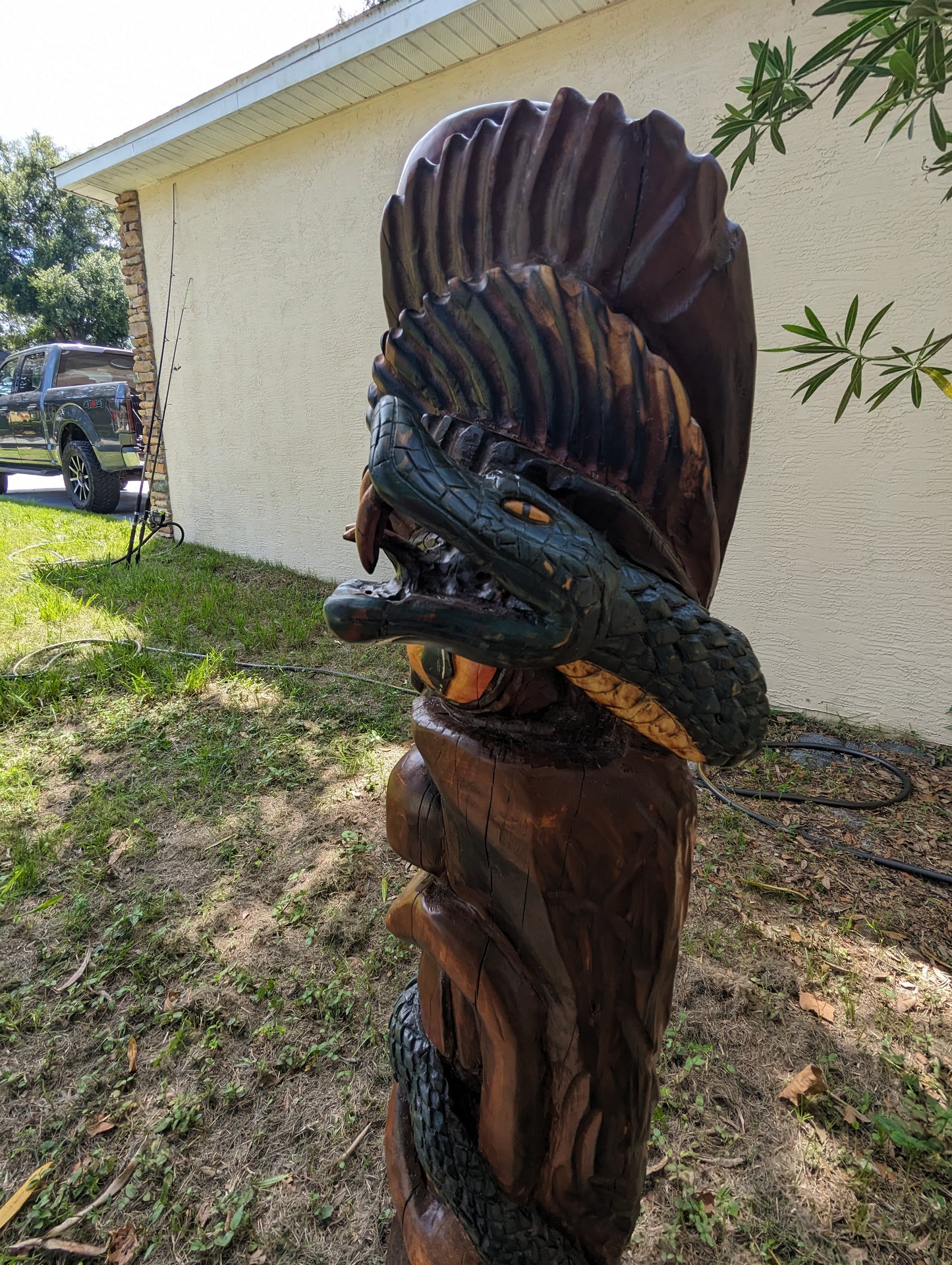 Snake and skull tiki